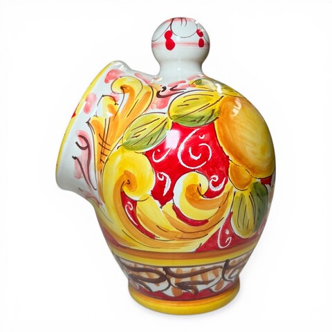 Saliera a salvadanaio in ceramica siciliana decoro barocco giallo con limoni e margherite Produzione artigianale di Santo Stefano di Camastra h.20cm