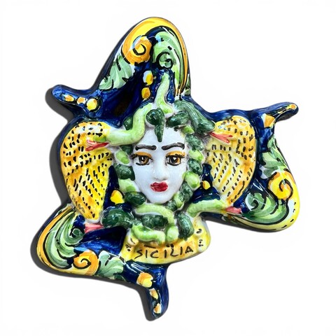 Trinacria ornamentale da parete decoro ornato in ceramica siciliana Produzione artigianale di Caltagirone lunghezza 14cm