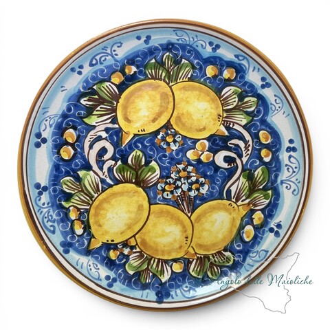 Piatto ornamentale da parete decoro limoni fondo blu in ceramica siciliana Produzione artigianale di Caltagirone diametro 26cm