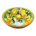 Ciotola centrotavola in ceramica siciliana con limoni decoro giallo barocco Produzione artigianale di Santo Stefano di Camastra Diametro 25cm