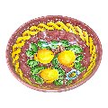 Ciotola centrotavola in ceramica siciliana con limoni decoro treccia fondo bordeaux Produzione artigianale di Santo Stefano di Camastra Diametro 25cm