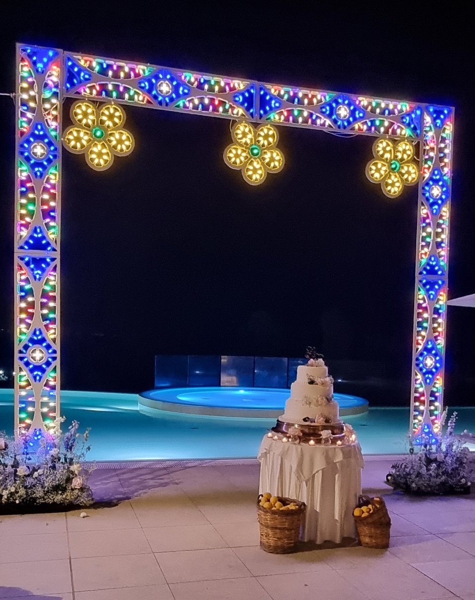 ARCHETTO TAGLIO TORTA FLOWERS 400 Luminarie Matrimonio