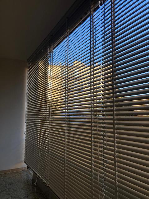 Riparazione tende alla veneziana e verticali