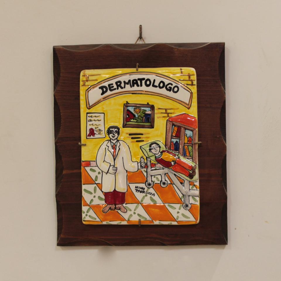 Targhe Mestiere a rilievo in ceramica e legno - Art.80/a Nino Parrucca