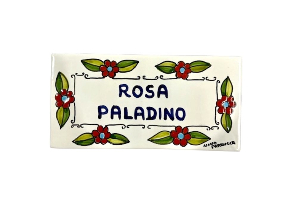 Piastrella personalizzata fiori arancio fondo bianco Nino Parrucca in ceramica