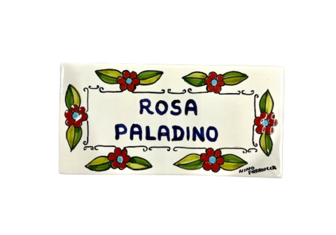 Piastrella personalizzata fiori arancio fondo bianco Nino Parrucca in ceramica