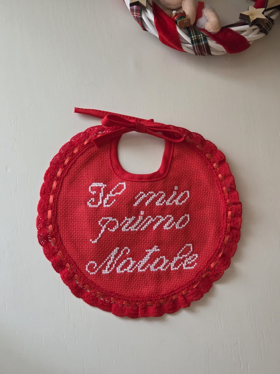 Bavetta natalizia in puro cotone Rossa Stafil Il mio primo Natale