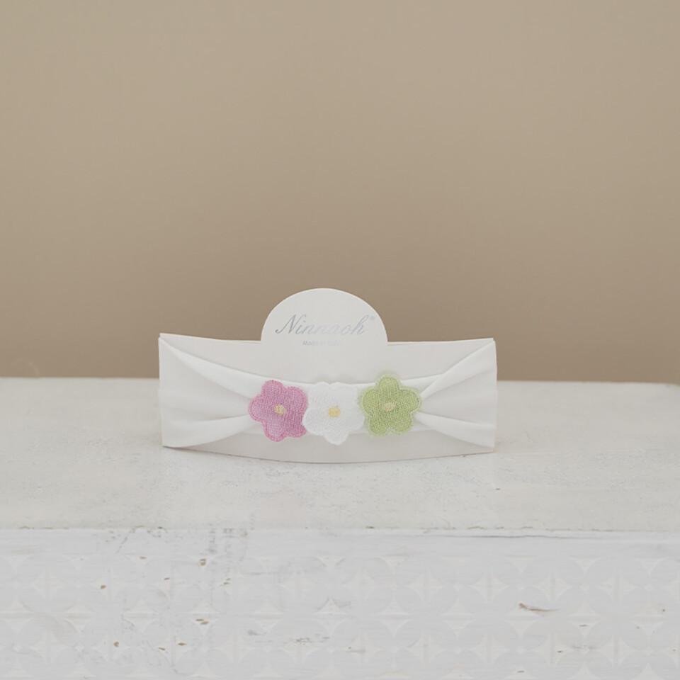 Fascetta elastica in cotone con fiori in rilievo Ninnaoh