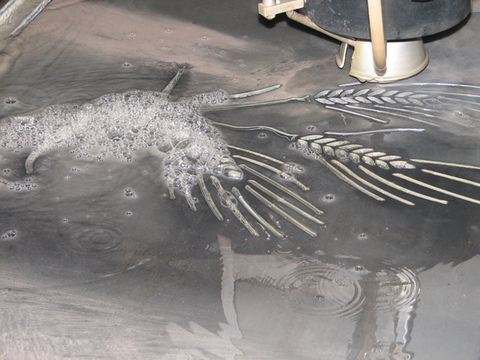 Lavori ferro e metalli con taglio ad acqua