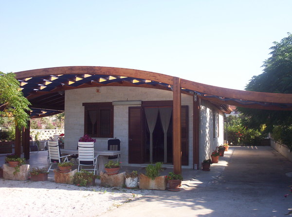PERGOLATO CON TRAVI LAMELLARI CURVI CORSO LEGNAMI SRL PERGOLATO