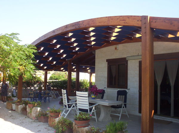 TRAVI IN LAMELLARI CURVE,BOOMERANG,AD ARCHI. CORSO LEGNAMI SRL TRAVI CURVE