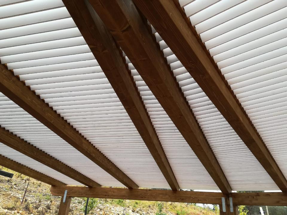 PERGOLATO IN LEGNO LAMELLARE CON DOGHE INCLINATE CORSO LEGNAMI SRL PERGOLATO