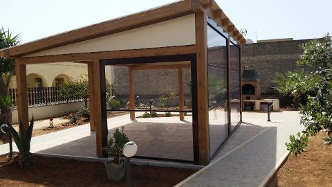PERGOLATO IN LEGNO LAMELLARE CON DOGHE INCLINATE CORSO LEGNAMI SRL PERGOLATO