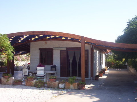 TRAVI IN LAMELLARI CURVE,BOOMERANG,AD ARCHI. CORSO LEGNAMI SRL TRAVI CURVE