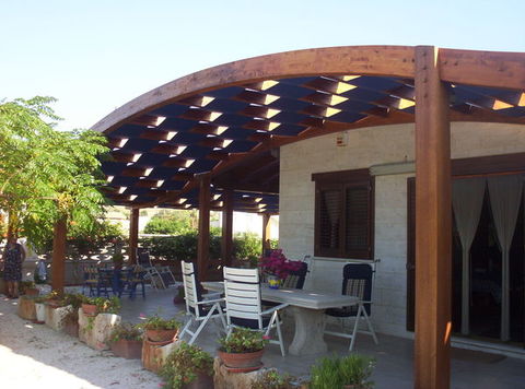 TRAVI IN LAMELLARI CURVE,BOOMERANG,AD ARCHI. CORSO LEGNAMI SRL TRAVI CURVE