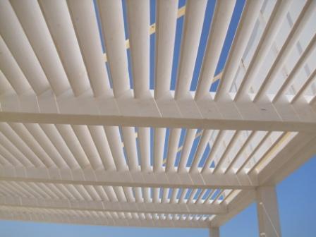 PERGOLATO IN LEGNO LAMELLARE CON DOGHE INCLINATE CORSO LEGNAMI SRL PERGOLATO