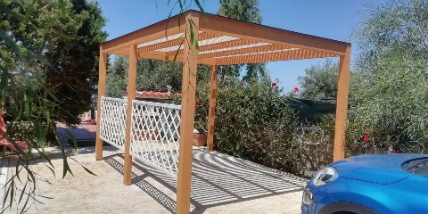 Pergola frangisole in legno lamellare