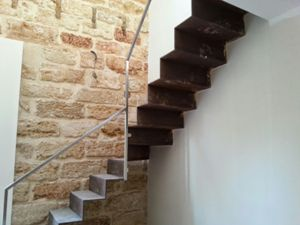 SCALE IN CORTEN