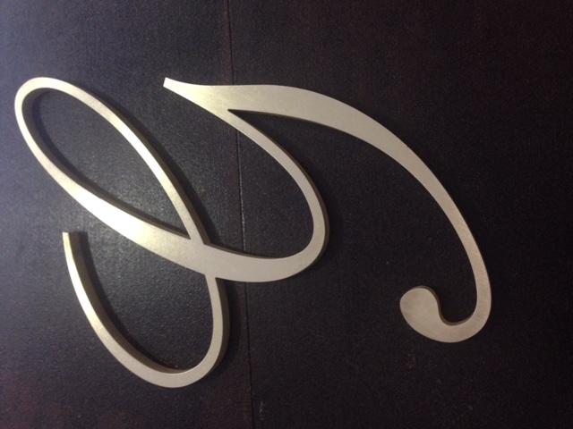 LETTERA IN OTTONE