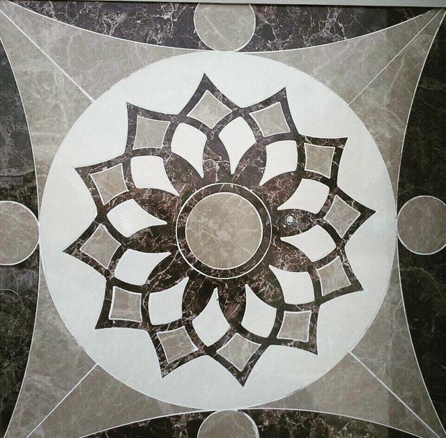 Pavimenti waterjet con intagli su marmo e graniti.
