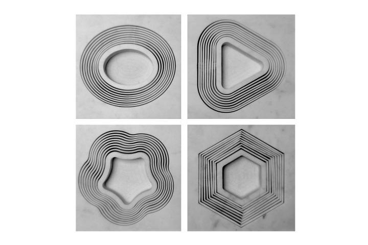 Pavimenti waterjet con intagli su marmo e graniti.