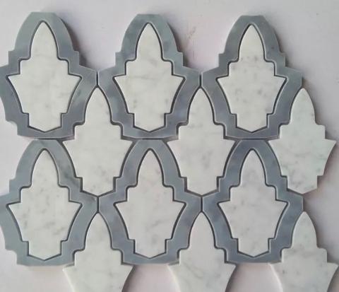 Pavimenti waterjet con intagli su marmo e graniti.