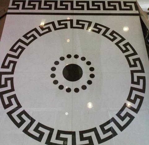 Pavimenti waterjet con intagli su marmo e graniti.