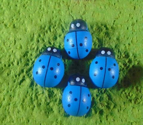 Coccinelle in legno colori diversi con biadesivo mm.13 - mm.18 - mm. 25 - Sconti per Fioristi e Aziende