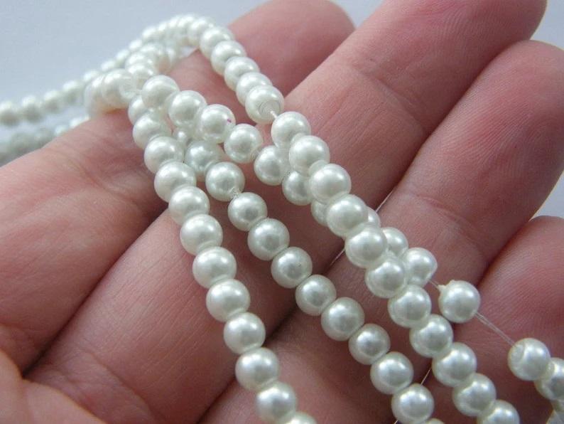 Collana di perle dm. 5 - Sconti per Fioristi e Aziende - lunga cm.135