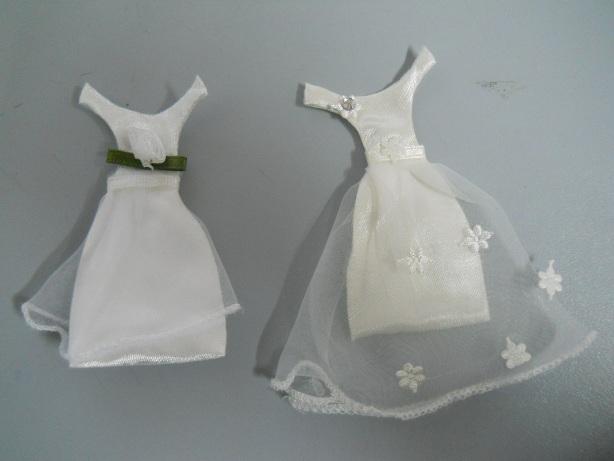 Vestitino da sposa con sacchetto porta confetto - Sconti per Fioristi e  Aziende - San Michele di Ganzaria (Catania) | Guida Sicilia