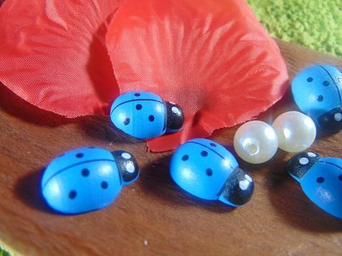Coccinelle con biadesivo in diverse misure in 4 colori - Sconti per Fioristi e Aziende