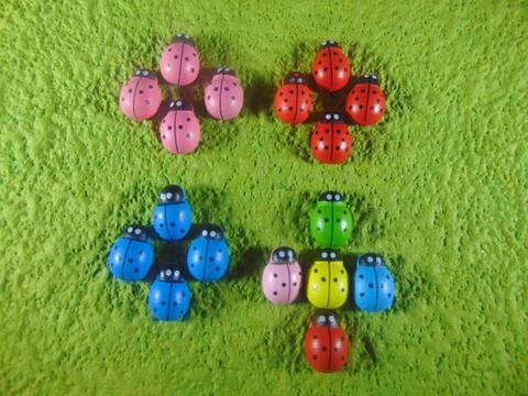 Coccinelle in legno colori diversi con biadesivo mm.13 - mm.18 - mm. 25 - Sconti per Fioristi e Aziende