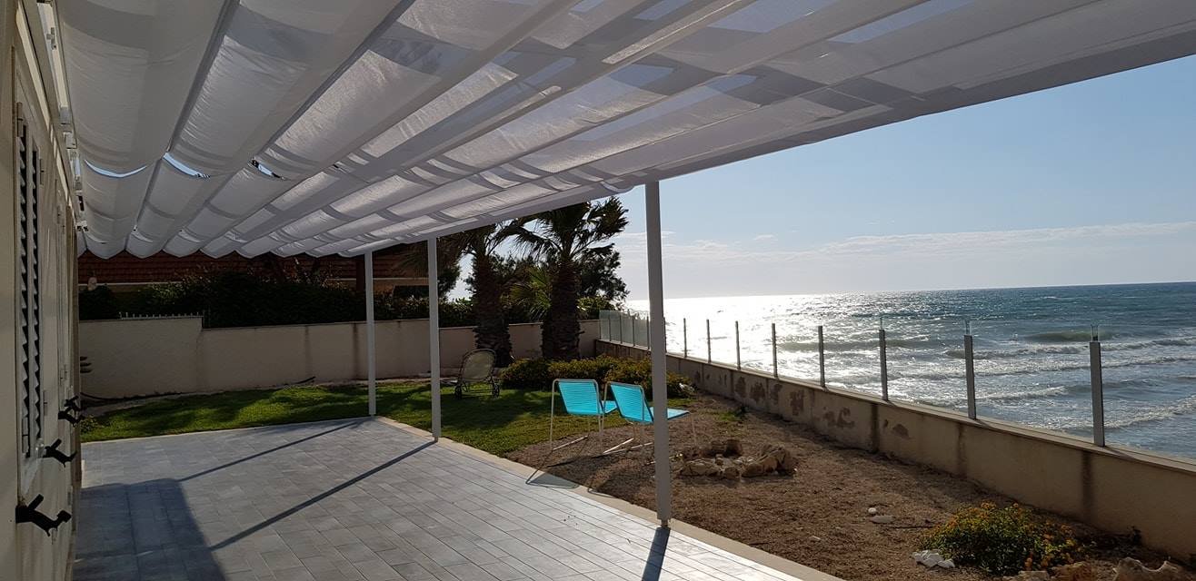 Tenda a onde e patio realizzati