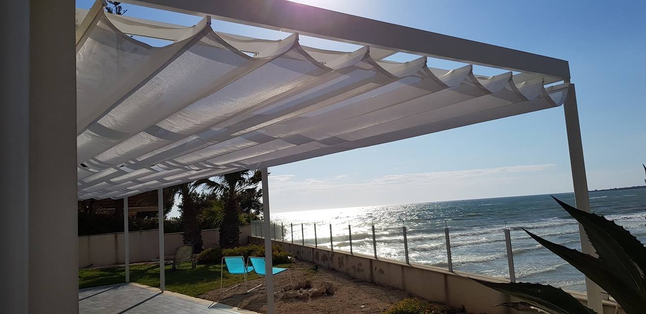 Tenda a onde e patio realizzati