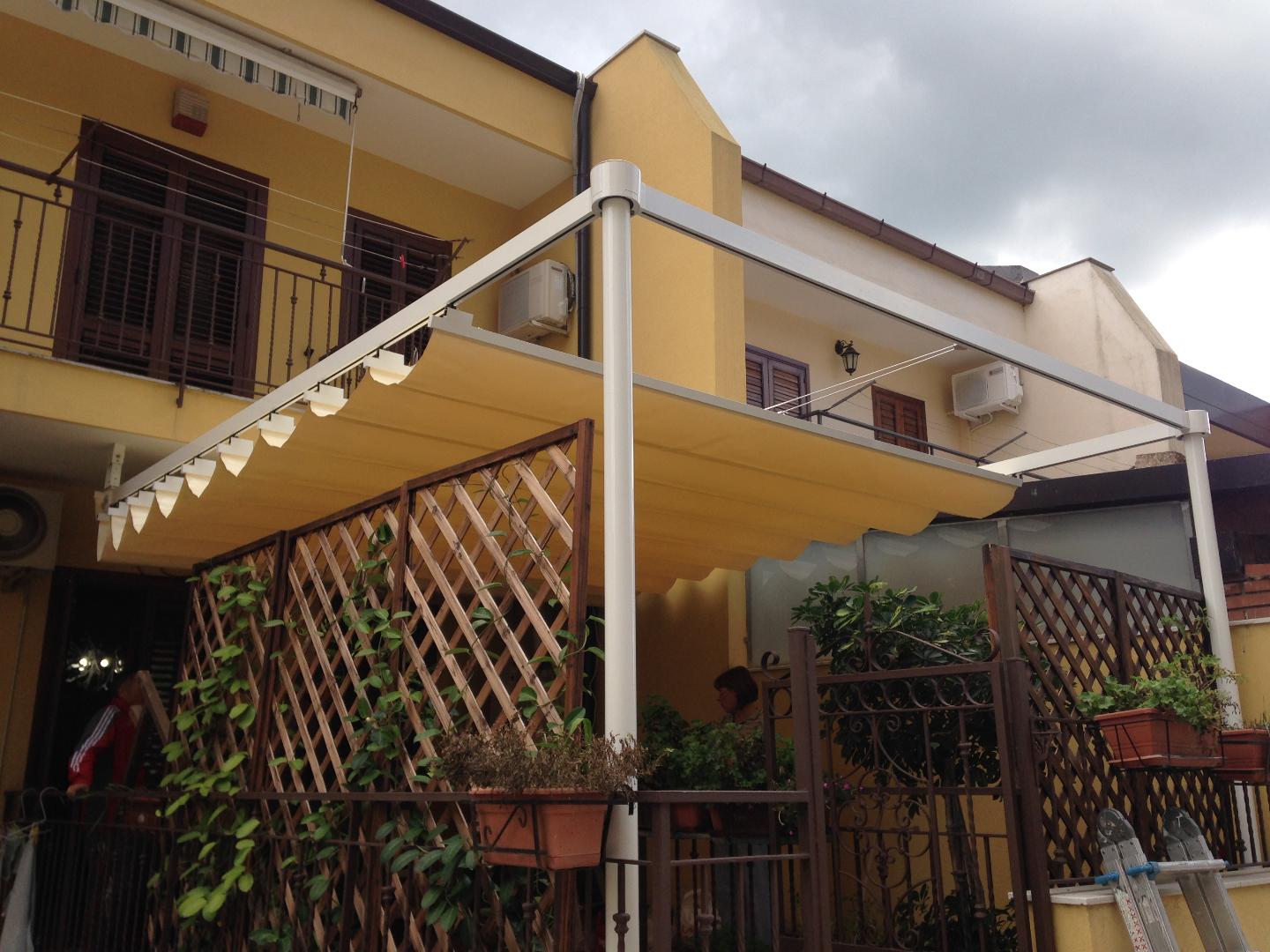 Tenda a onde e patio realizzati