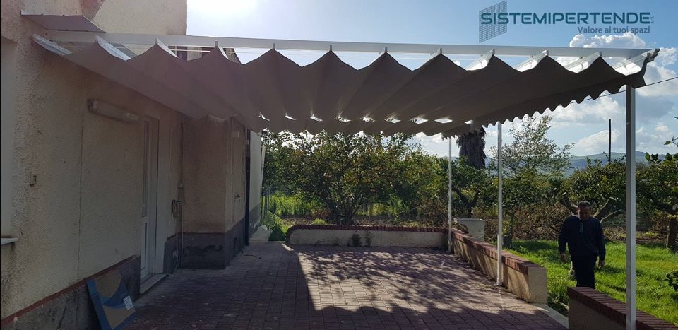 Tenda a onde e patio