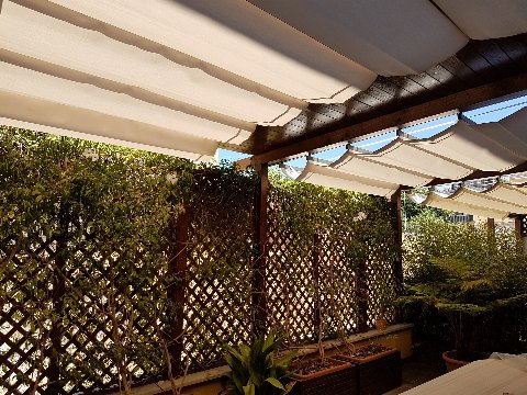 Tenda a onde e patio