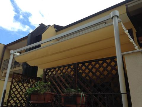 Tenda a onde e patio realizzati
