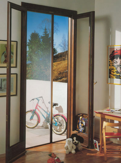 Zanzariera a Molla Laterale e Centrale Su Misura