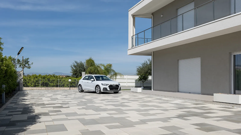 FORNITURA E POSA IN OPERA DI MASSELLI AUTOBLOCCANTI VALENTE BIG FLOOR